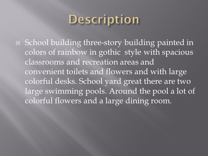 Description  School building three-story building painted in colors of rainbow in gothic 